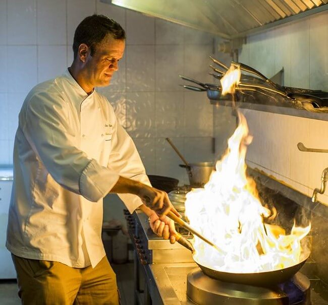 Baby light my fire! Chef Martin creates and serves delectable cuisine.
